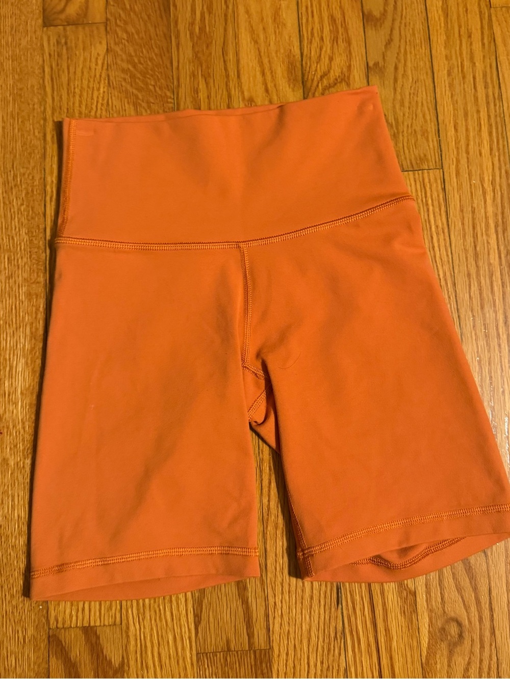 Aritzia TNA orange bikers shorts size XS